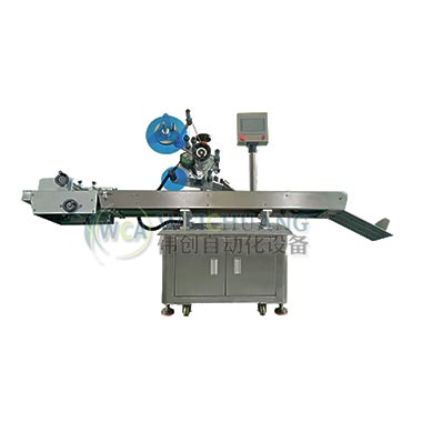 壓扁小彩盒分頁貼標(biāo)機